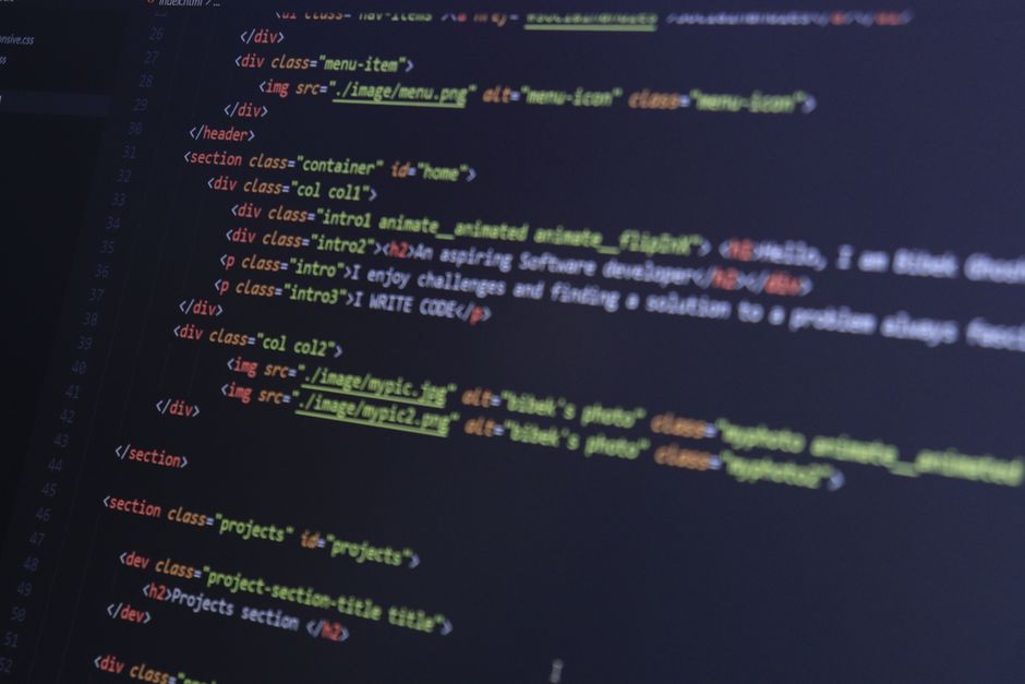HTML and CSS code on a computer monitor, highlighting web development and programming.